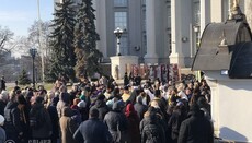 Believers gather at the prayer service in support of Tithes Monastery