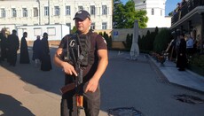 Law enforcement officers block two buildings of Kyiv-Pechersk Lavra