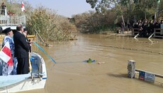 Patriarch Theophilos of Jerusalem consecrateas the Jordan waters  